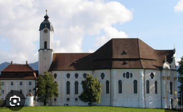 <p><strong>The Pilgrimage Church of Wies </strong>in Bavaria Germany</p><p>By <strong><em>Dominikus Zimmerman</em></strong></p><p>A remarkable example of rococo architecture, characterized by its harmonious proportions, elegant curves and richly adorned interior featuring intricate stucco work and frescoes by <strong><em>Franz Xaver Simm.</em></strong></p><p>Completed in <strong>1748, </strong>the church showcases a dramatic vaulted ceiling, ornate altars and striking façade with a central dome all designed to create a sense of lightness and divine beauty, contributing to its designation as <strong><em>UNESCO World Heritage Site.</em></strong></p>