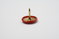 <p>a small pin with a sharp point and a broad, flat head, used for fastening papers to a board or wall. </p>