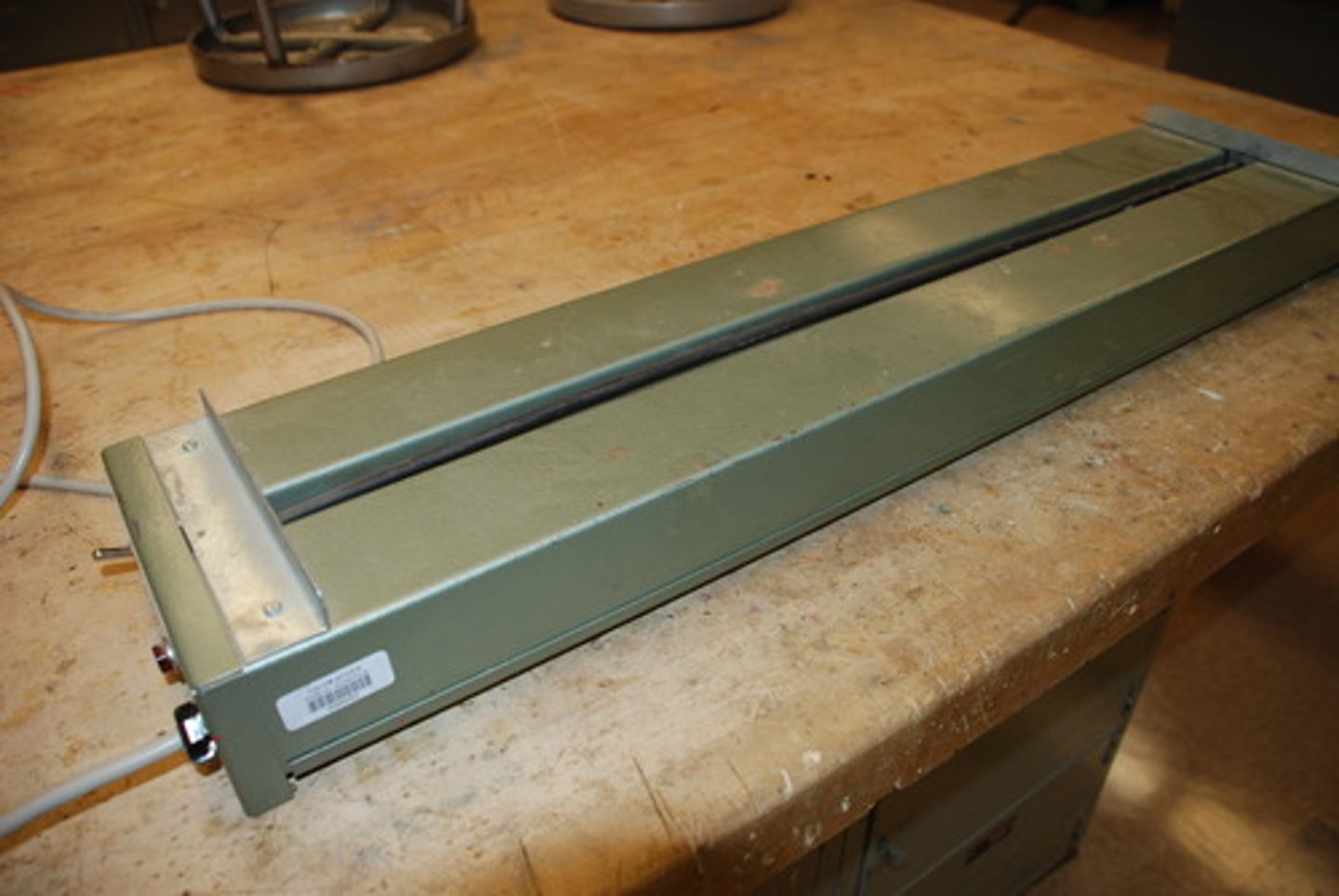 <p>Is a machine which heats acrylic plastic along a narrow strip. This allows it to soften and bend easily.</p>