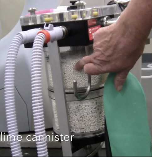 Contains soda lime which absorbs the carbon dioxide and water vapour expired by the patient.