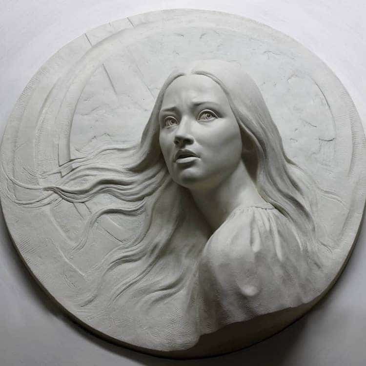 <p>forms and figures stand out from the background to hold or more than half of their natural depth</p>