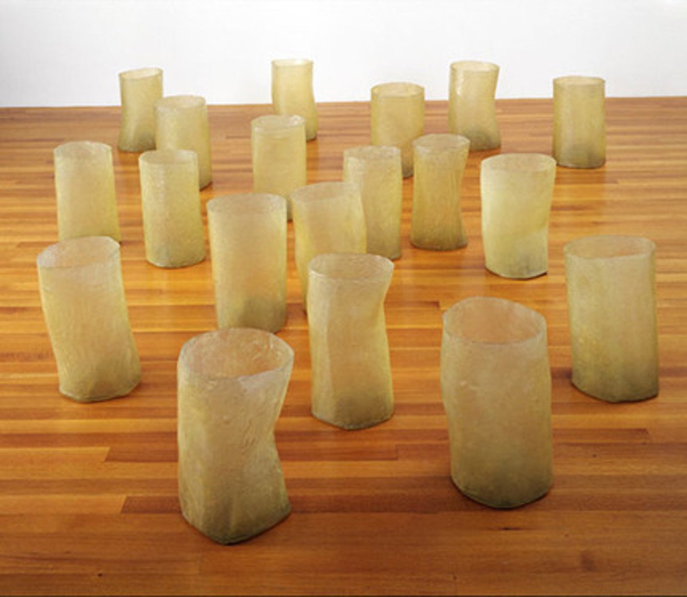 <p>is the visual key that ties Eva Hesses' installation piece together, unifies it, and controls the viewers' eye</p>
