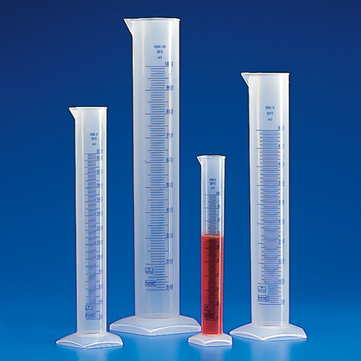 <p>A measuring device, graduated to contain liquids or solutions; tall versions are equipped with a plastic bumper to prevent shattering if it is knocked over</p>