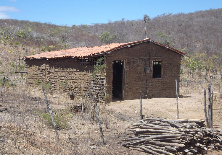 <p>Building style that reflects the cultural, historical, and environmental conditions of a <strong>small, cohesive, and homogeneous group</strong> of people</p><p><strong>Features of Traditional Architecture</strong></p><ul><li><p>Local Materials - use materials available in the environment</p></li><li><p>Climate Adaption - designed for the local climate conditions</p></li><li><p>Cultural and Religious Beliefs - incorporate symbols and practices significant to the community's heritage </p></li><li><p>Slow Diffusion - Passed down through generations and likely only through relocation diffusion</p></li></ul><p></p>