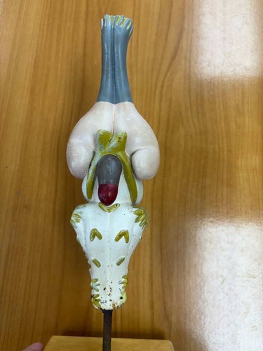 <p>Yellow structure and animal</p>