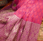 <p>the two front pleats in Sinh (Thai skirt)</p>
