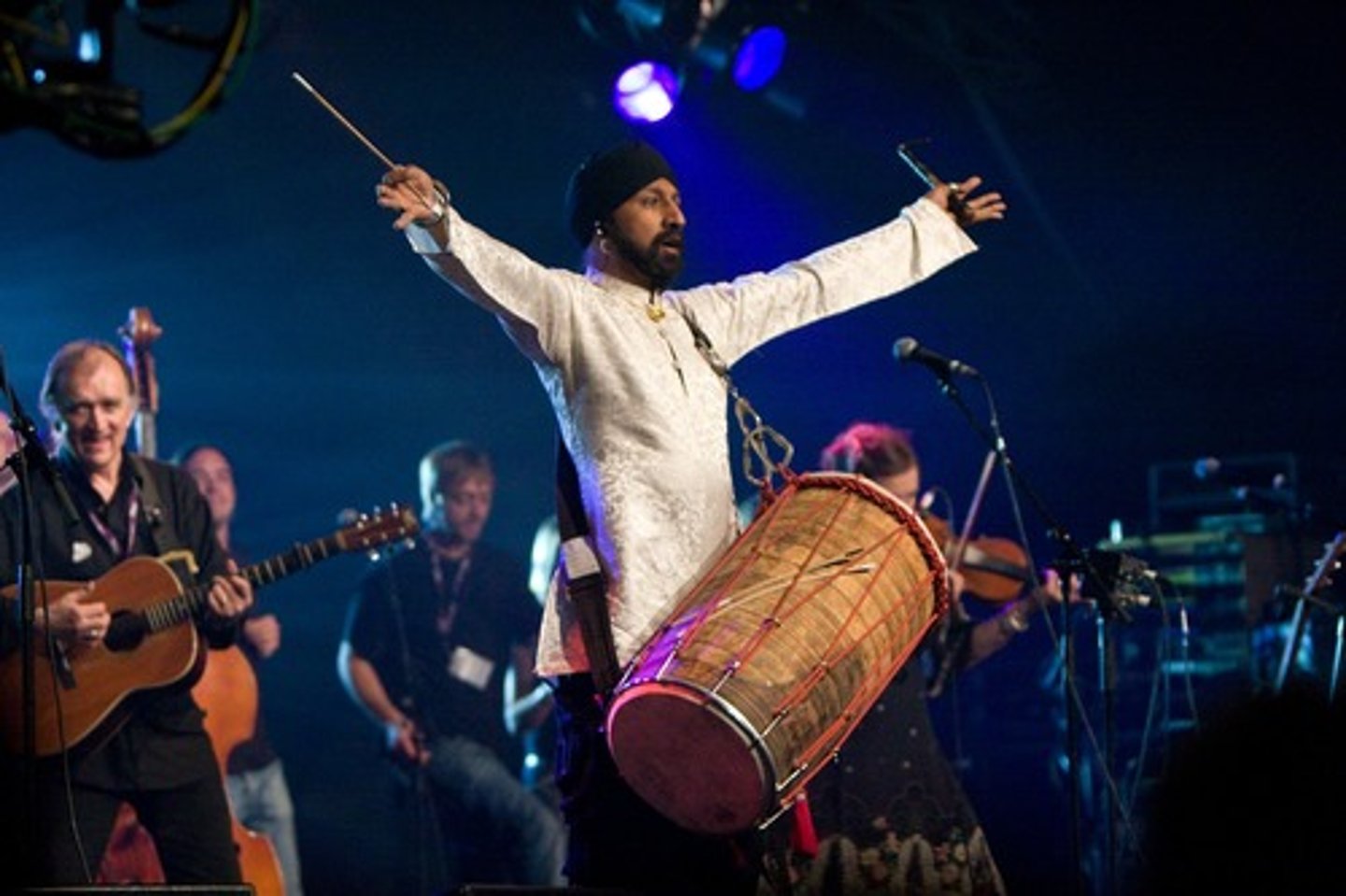 <p>A type of drum used in Bhangra music (smaller than the Dholak) and played with the hands, often slung from the shoulder. The Dholakplays more complex rhythms and decorated parts along with the Dhol.</p>