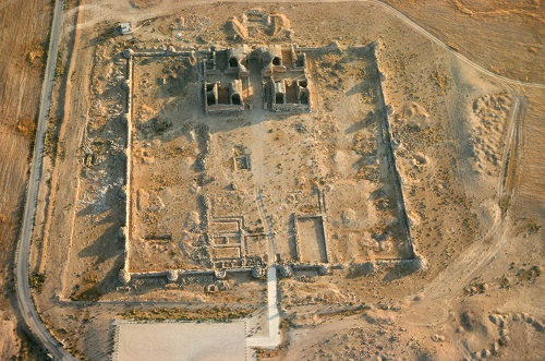 <p>Mshatta, Jordan, 8th century, Umayyad Dynasty</p><p>- Vast rectangular + walled enclosure; divided in 3rds (Only central third was built)</p><ul><li><p>Featured an elaborate throne room and ornamented limestone Facade; inspired by Byzantines with potted vines and leaves</p></li><li><p>Special Dome: emerges purpose of marking a special architectural place (Place of the prince, middle of the sphere, middle of Muslim world)</p></li></ul><p></p>