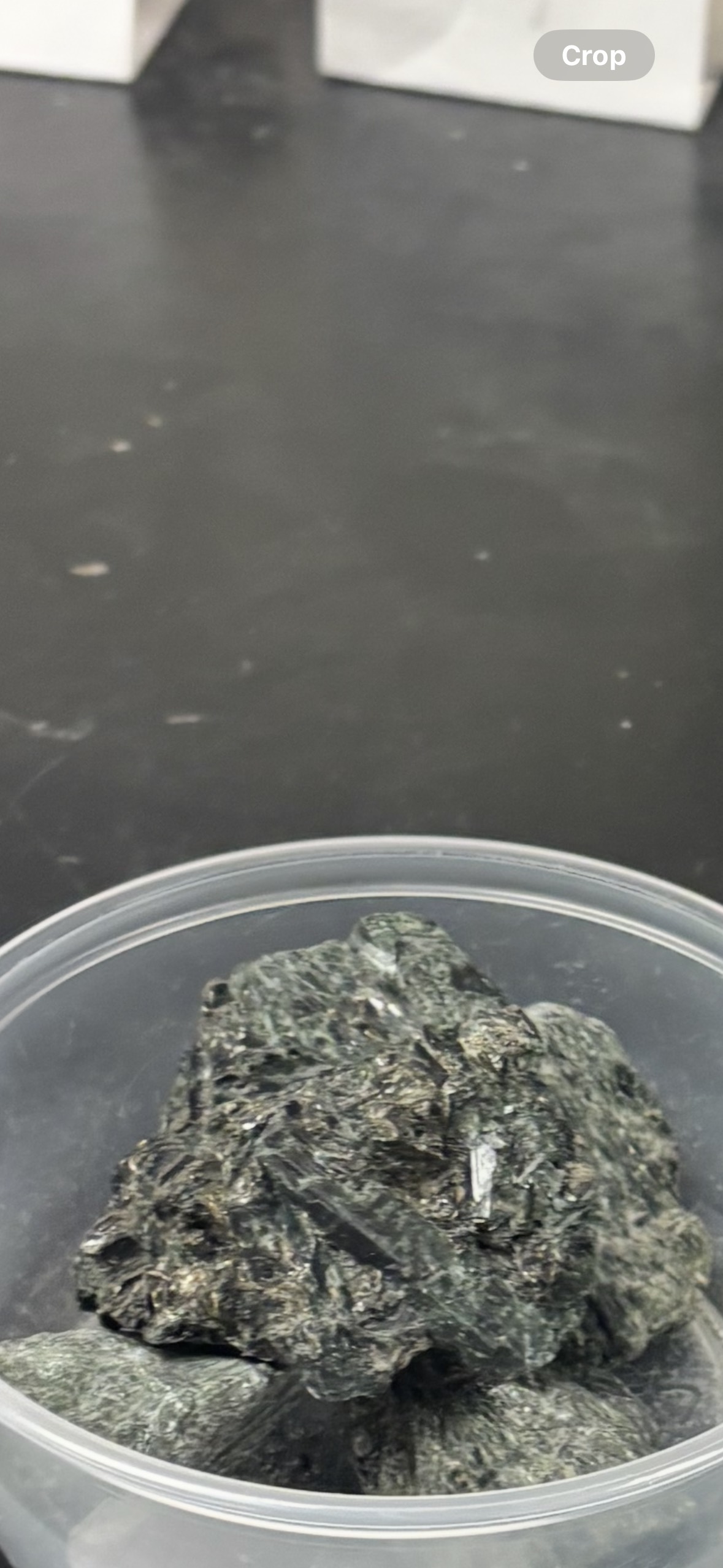 <p>Green amphibole mineral; forms in low- to medium-grade metamorphism of mafic rocks.</p>