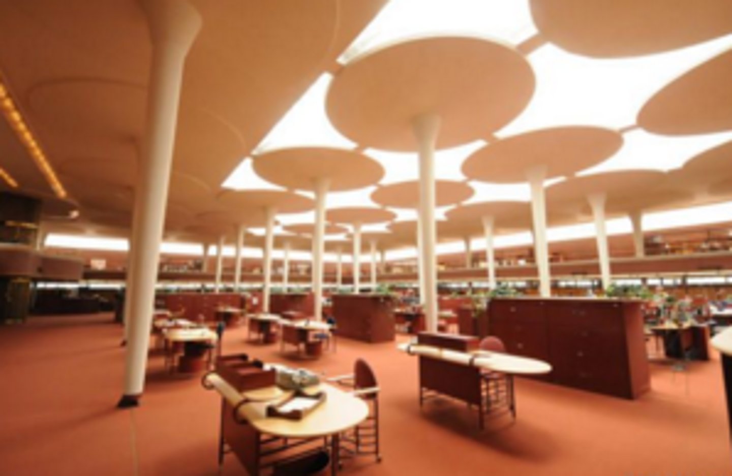 <p>Adminsitration Building designed by Frank Lloyd Writght in Racine, Wisconsin. It is constructed of more than 200 sizes and shapes of bricks. Light shines into the building through several layers of glass tubes that cannot be seen through.</p>