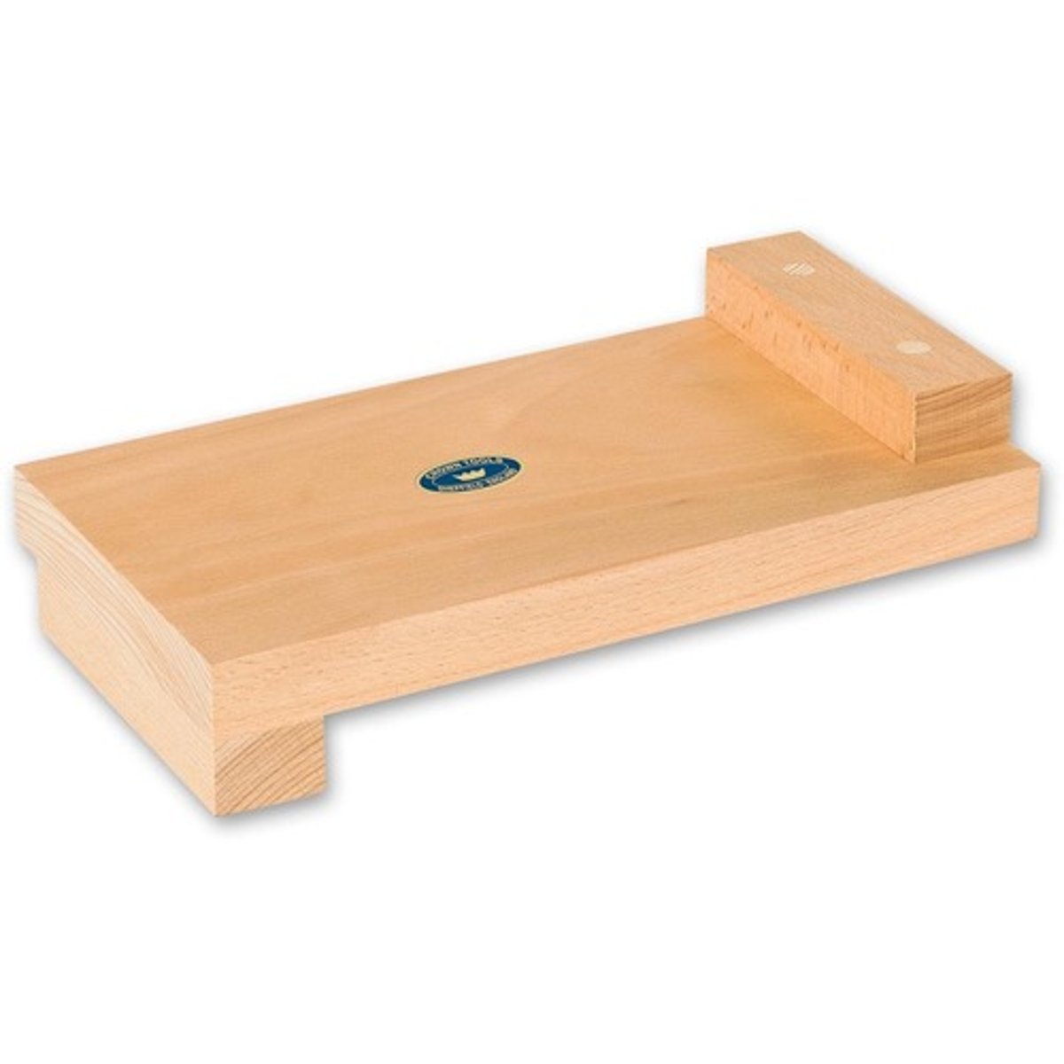 <p>A wooden plate with a raised edge on each end (opposite sides) to hold wood in place on a table while cutting.</p>