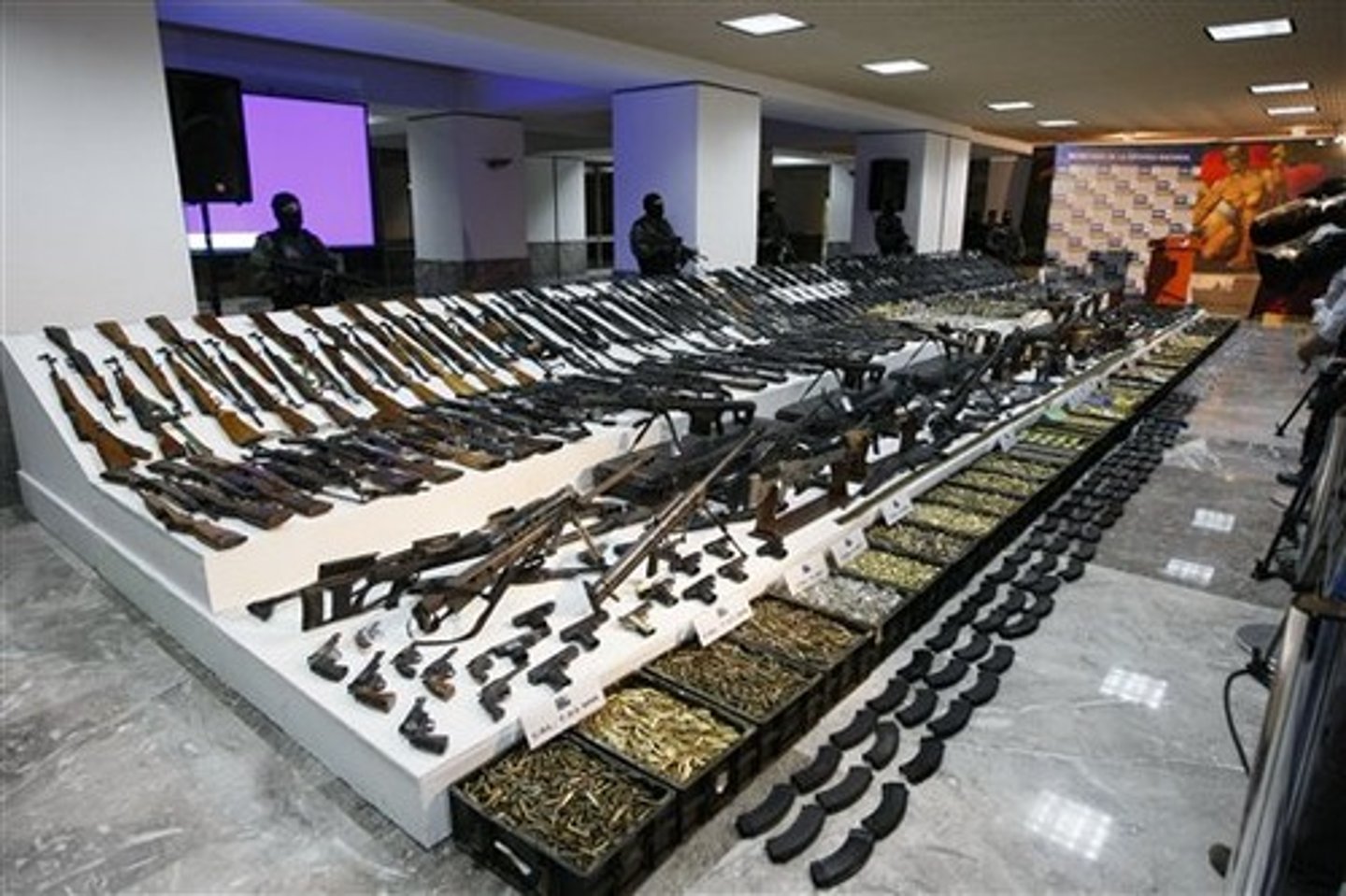 <p>to build up or accumulate large quantities of weapons</p><p>ex: Several states are ..., raising fears of an imminent arms race.</p>