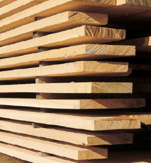 <p>short lengths of scrap wood (called <strong>stickers</strong>) <u>are inserted between each board </u>in a stack to <u>allow air to circulate all around the board</u></p><p>may take months or years </p><p>without stickers, lumber may dry unevenly and attract mold</p>