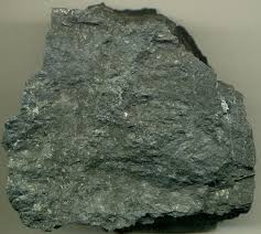 <p>-sedimentary</p><p>-clastic</p><p>-fine grained</p><p>-well sorted</p><p>-unidentifiable shape </p><p>-quartz, clay </p><p>-forms in <span>relatively quiet depositional environments where silt-sized particles can settle out of moving water or wind and accumulate</span></p><p><span>uses: construction</span></p>