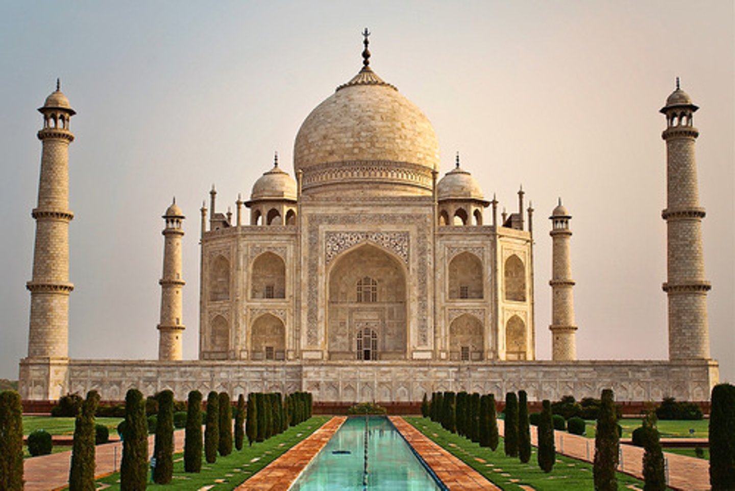 <p>White-splendored tomb built by Shah Jahan for his favourite wife, Arjumand Banu Begum (Mumtaz Mahal). Ustad Ahmad Lahauri is considered to be the principal designer. It sits on a raised platform surrounded by four minarets.</p><p>Sits on a raised platform surrounded by four minarets.</p>