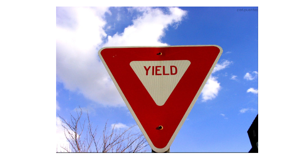 <p>What does a Yield sign require you to do?</p>