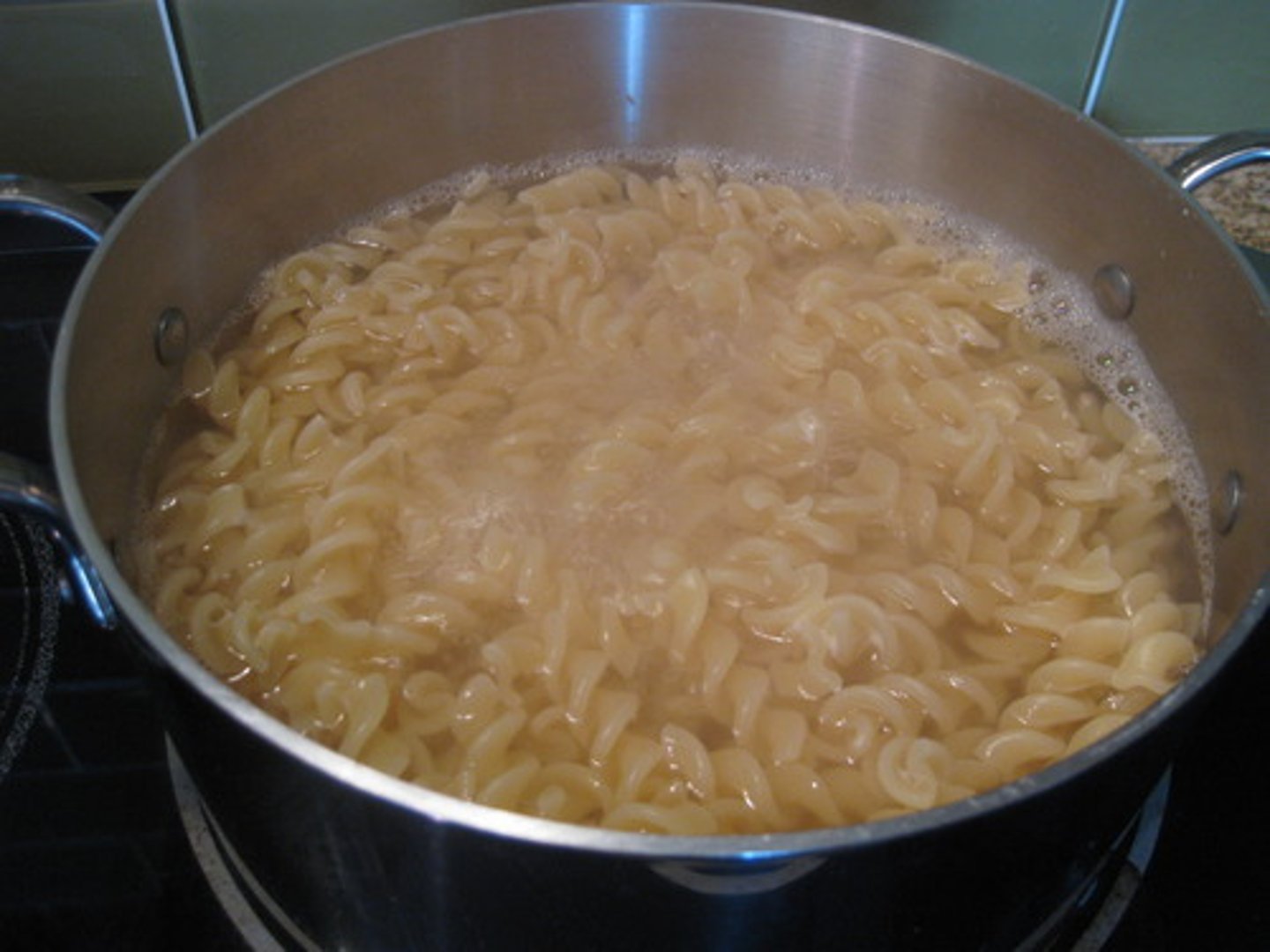 <p>Water evaporated due to the heat from the stove.</p>