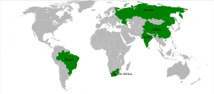 <p>Nation that has moved away from an economy primarily based on <strong>agriculture</strong> and <strong>raw material extraction</strong> to one based on <strong>manufacturing</strong> and <strong>industrial production</strong></p><p><strong>BRICSM = Brazil, Russia, India, China, South Africa, Mexico</strong></p><p><strong>Key Characteristics of NICs</strong></p><ul><li><p><strong>Rapid Industrialization:</strong> A fundamental shift from the primary sector (agriculture) to the secondary sector (manufacturing)</p></li><li><p><strong>High Economic Growth:</strong> Sustained, rapid growth in <strong>Gross Domestic Product (GDP)</strong>, often faster than highly developed countries</p></li><li><p><strong>Export-Oriented:</strong> A focus on producing manufactured goods for <strong>export</strong> (e.g., electronics, textiles, vehicles), which attracts <strong>Foreign Direct Investment (FDI)</strong></p></li><li><p><strong>Rapid Urbanization:</strong> Mass migration of people from rural areas to urban centers in search of industrial jobs</p></li><li><p><strong>Improved Infrastructure:</strong> Investment in modern transportation, communication, and energy networks to support industry</p></li><li><p><strong>Rising Standard of Living:</strong> Increases in average income, education, and access to healthcare, though often accompanied by persistent <strong>regional and social inequality</strong></p></li></ul><p></p>