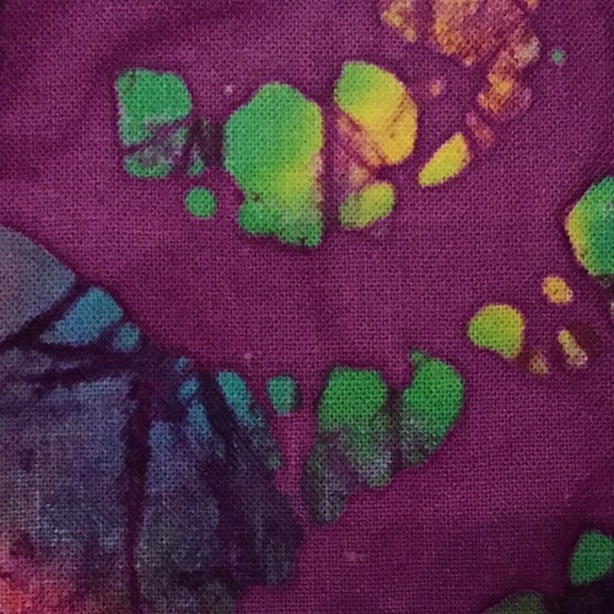 <p>using wax to prevent the fabric from absorbing dyes in these areas</p>