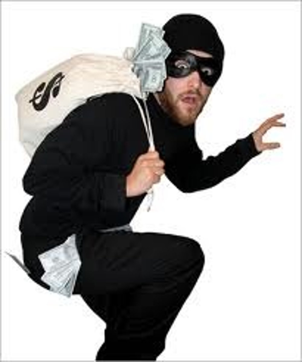<p>a thief who steals from someone by threatening violence</p>