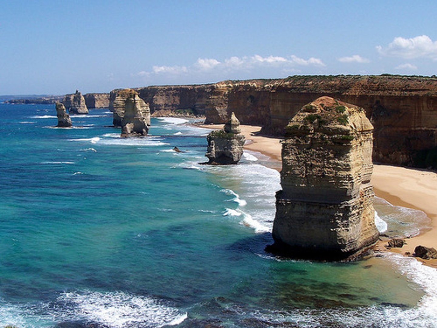 <p>a coastal feature that results from erosion; a section of the headland that has become separated from the mainland and stands as a pillar of rock</p>