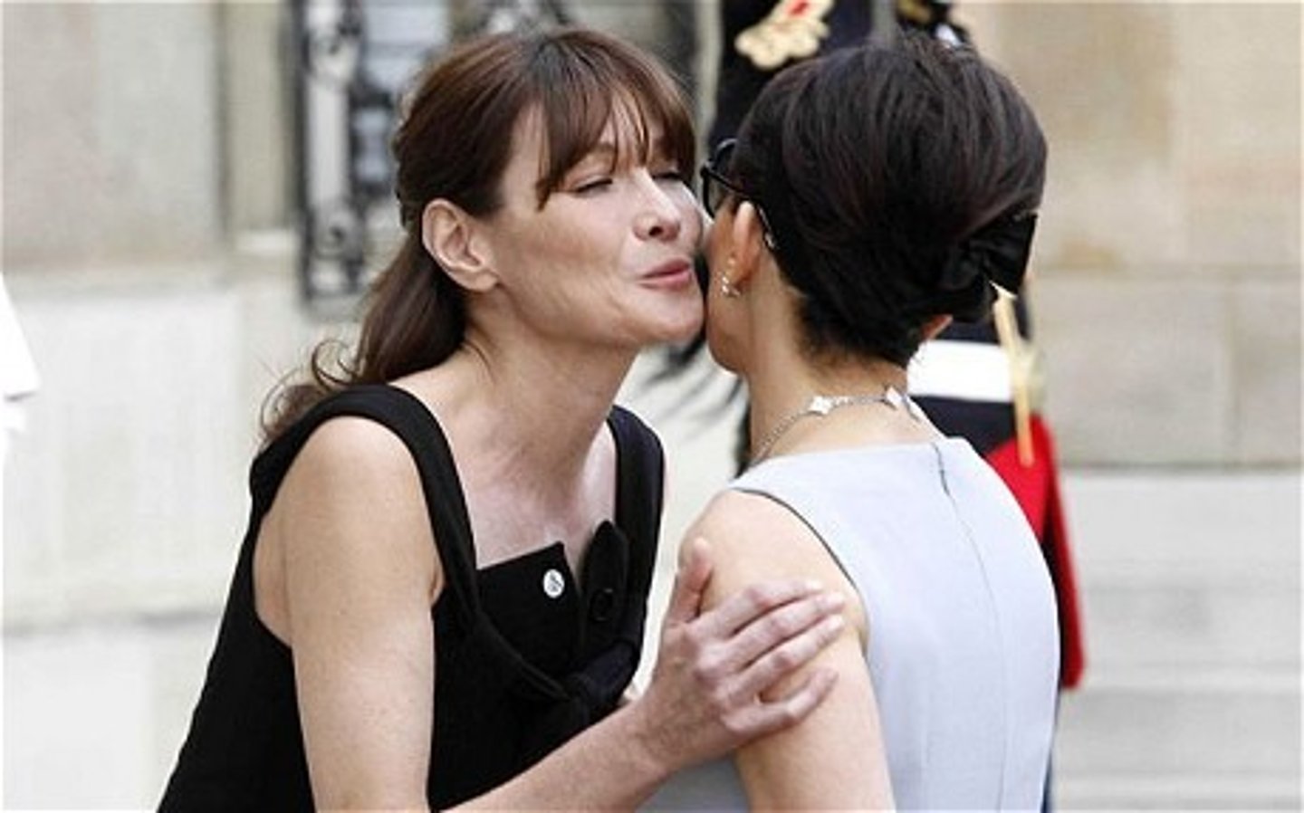 <p>little kiss (usually on the cheek)</p>