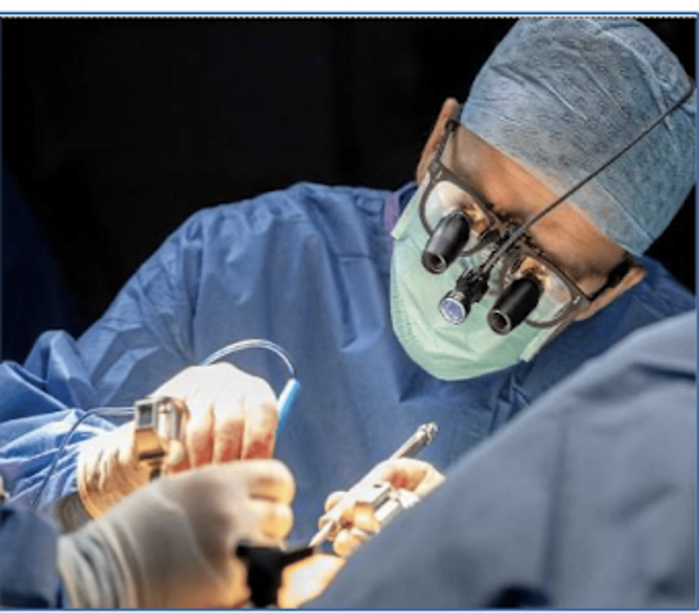 <p>What is the surgeon wearing?</p>