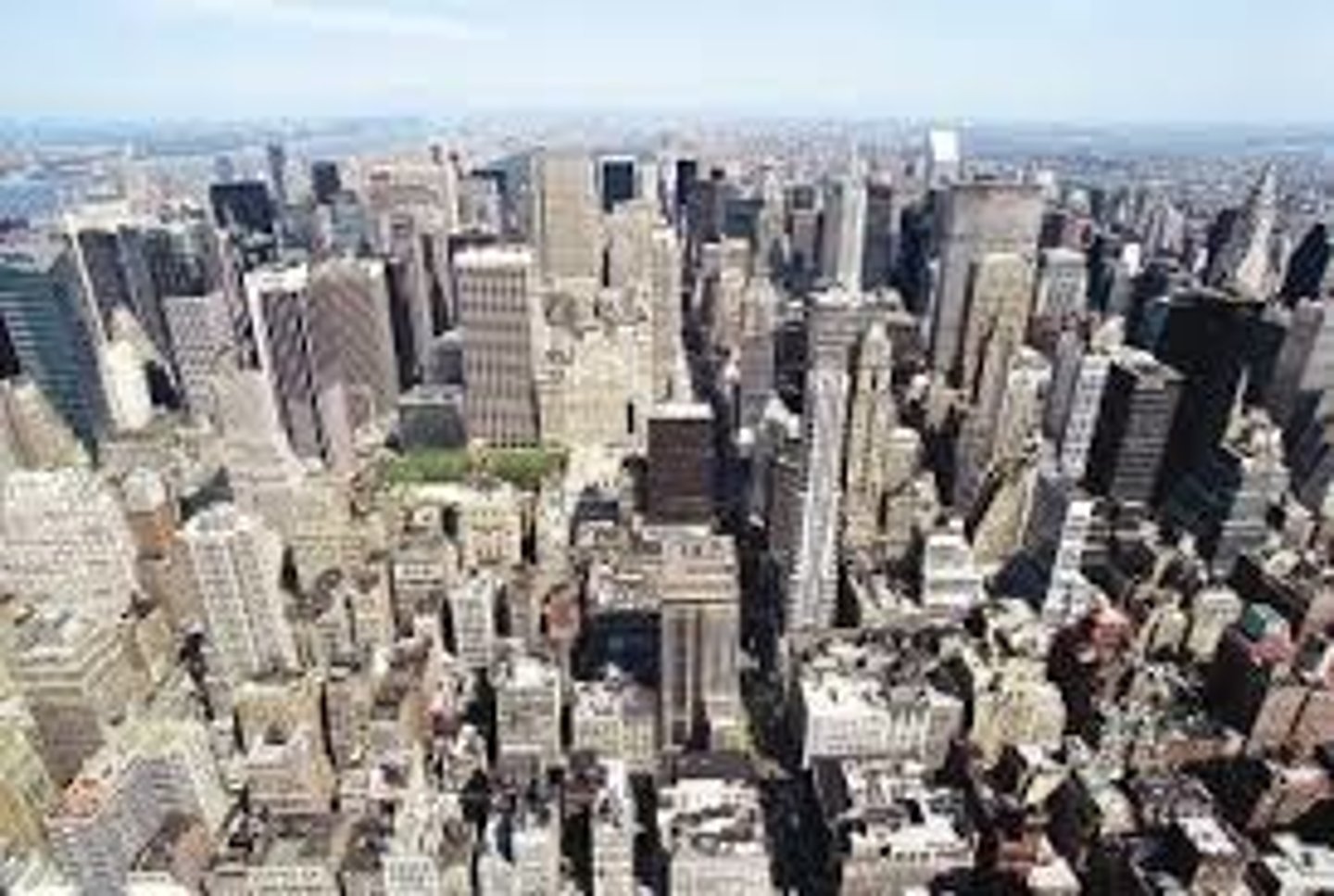 <p>a. Human made surroundings that provide the setting for human activity</p>