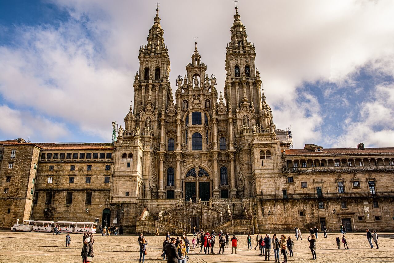 <p>located in santiago, spain; a pilgrim site</p><p>features lots of carvings and begins off really romanesque, but the arches present start to point little by little; features the roman portals and has a trumeau</p>
