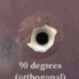 <p>when a bullet hits a surface at a 90 degree angle (straight on)</p>