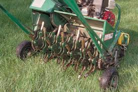 <p><span>&nbsp;Machine that removes small cores of soil to reduce compaction and improve aeration.</span></p>