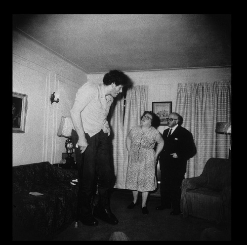 <p>A Jewish Giant at Home with His Parents, in the Bronx, N.Y</p>