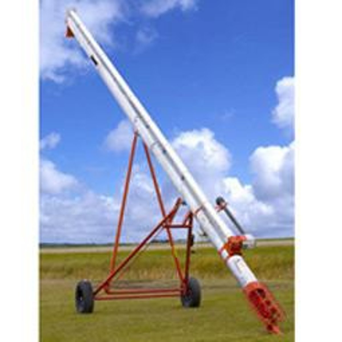 <p>agricultural screw elevator with a long metal tube raises and transports grain</p>