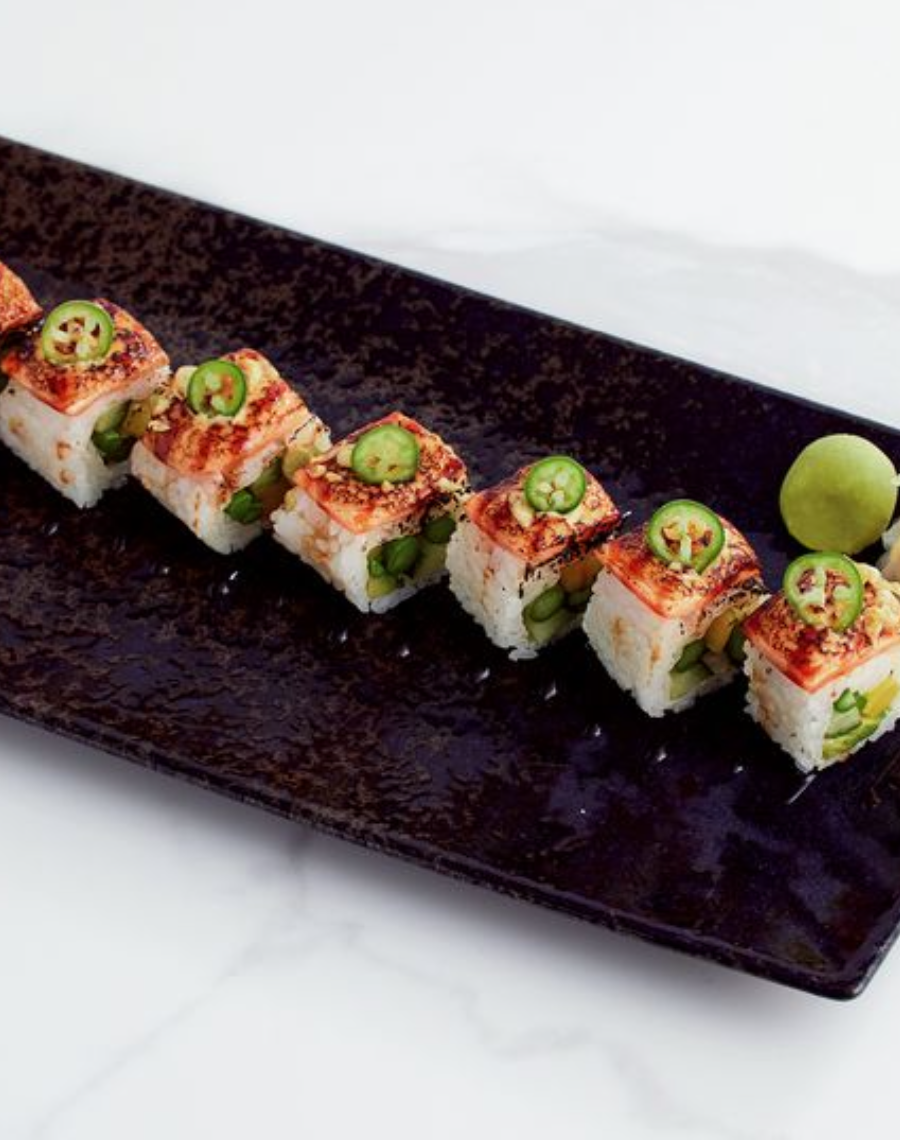 <ul><li><p><em>Our flame torched salmon creates a dynamic fusion of rich, creamy, smoky, and vibrant notes. Sushi preset.</em></p></li><li><p><em>Common allergens</em></p><ul><li><p>egg</p></li><li><p>seafood</p></li><li><p>sesame</p></li><li><p>soy</p></li><li><p>wheat</p></li><li><p>sulfites</p></li><li><p>mustard</p></li></ul></li><li><p><em>Ingredients:</em></p><ul><li><p>Avocado</p></li><li><p>Mango </p></li><li><p>flame torched, oceanwise steelhead</p></li><li><p>crispy tempura</p></li><li><p>serrano pepper</p></li><li><p>sushi sauce</p></li><li><p>cucumber</p></li><li><p>seasoned sushi rice</p><p></p><p></p></li></ul></li></ul><p></p>