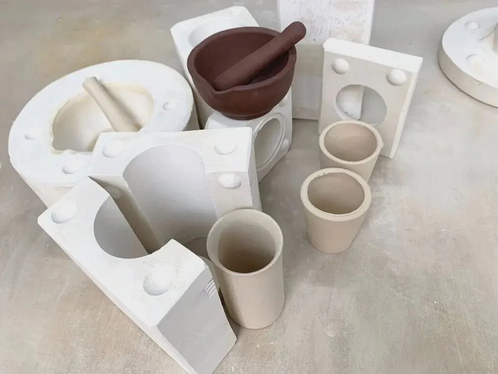 <p>a process for forming a ceramic object by pouring a clay slip into a hollow, porous (usually plaster) mold and leaving it there long enough for a layer of clay to settle and thicken on the mold wall. The remaining slip is poured off, and the object is removed from the mold when it has dried. </p><ul><li><p>Also called slip casting or solid casting.</p></li></ul><p></p>