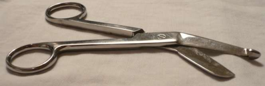 <p>Used to remove bandages and dressings Probe tip is blunt; inserted under bandages with relative safety</p>