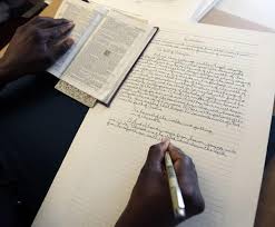 <p>Scribes making handwritten copies of documents.</p>