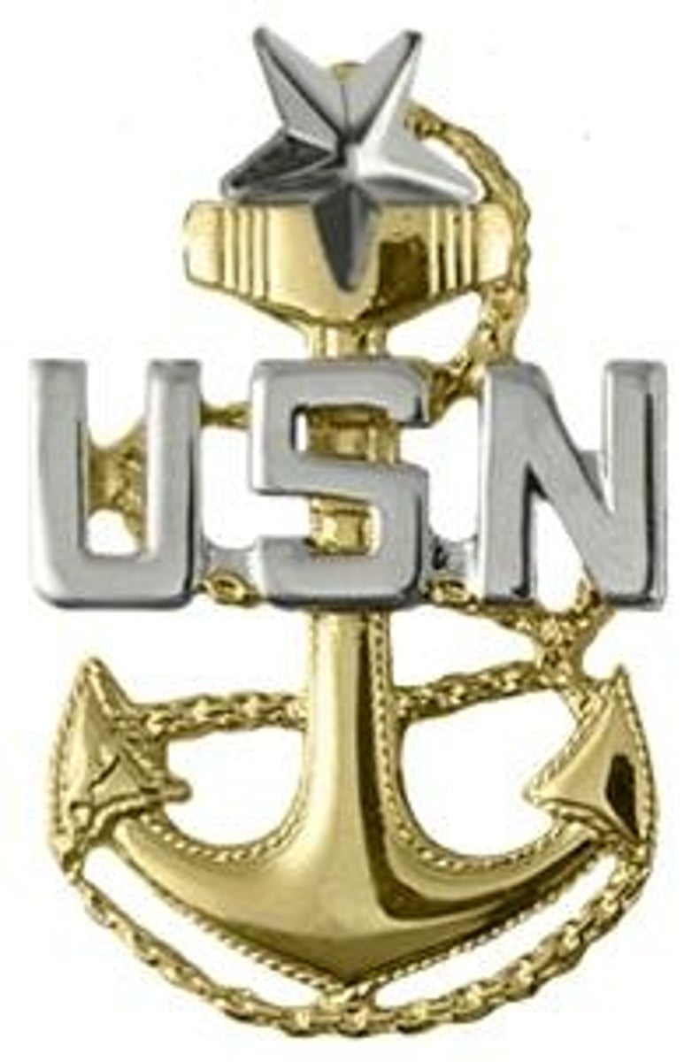 <p>Senior Chief Petty Officer (SCPO)</p><p>Gold anchor with USN and one silver star</p>