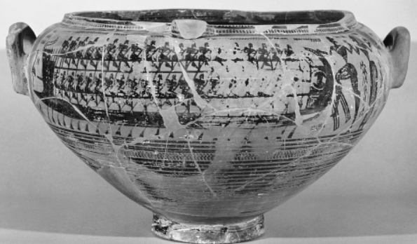 <p>Who holds a wreath in her left hand? (Figure 5.2)</p>