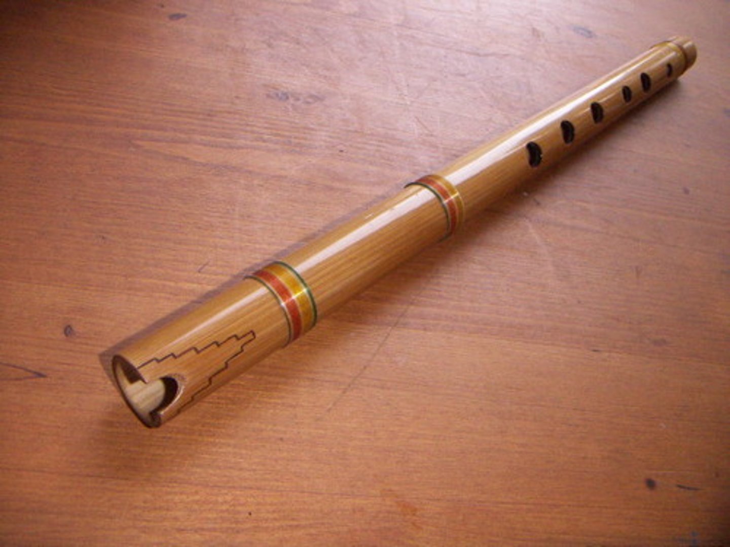 <p>Appalacian end blown flute; breathy sound<br><br>Aymaran dry-season instrument. End-notched flute with V-notch.<br>-metal flute</p>