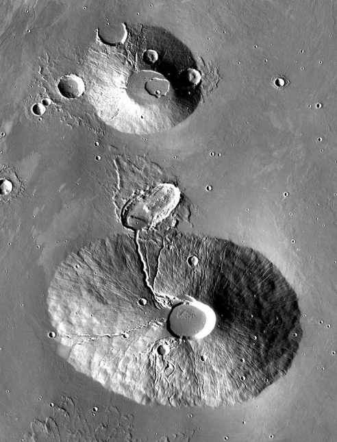 <ul><li><p>dome-shaped edifices that are much steeper and larger than Tharsis shields</p></li><li><p>central calderas large in proportion to base diameters</p></li><li><p>densite of impact craters reveal they are older than large shields</p></li></ul><p></p>