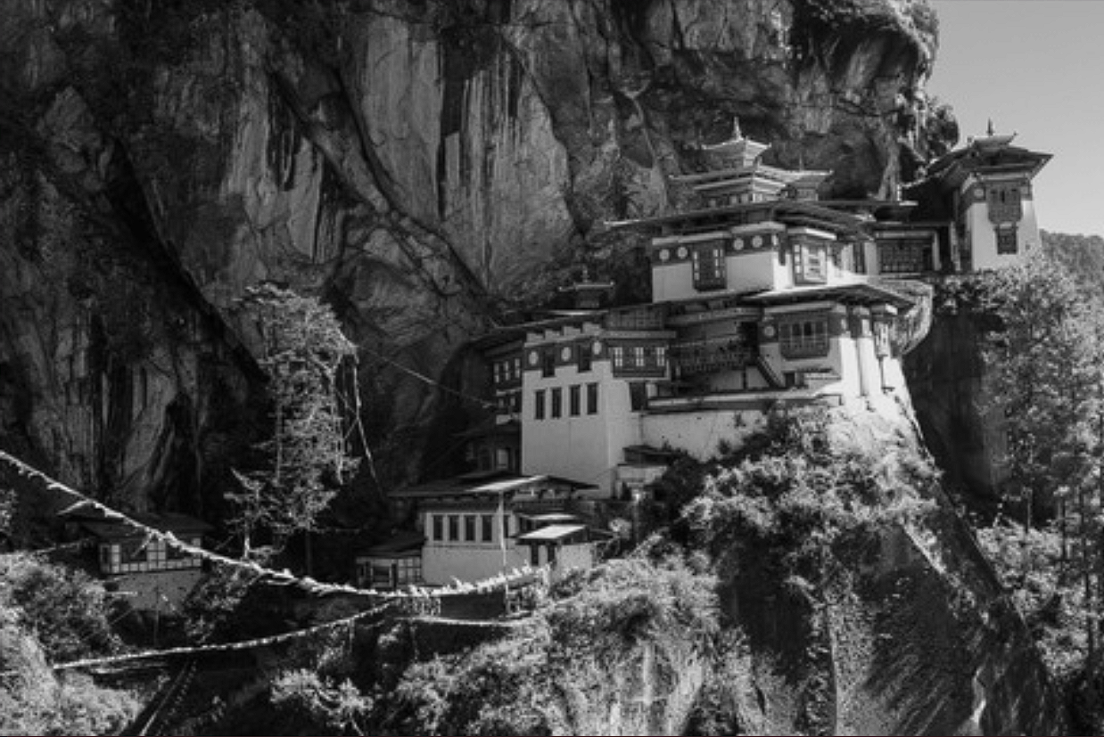 Identify which of the following concepts or processes is symbolized by the pagoda in the image..