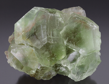 <ul><li><p>CaF<sub>2</sub></p></li><li><p>mohs 4</p></li><li><p>isometric</p></li><li><p>octahedral cleavage</p></li><li><p>economically important</p><ul><li><p>lowers melting point of metals and removes impurites</p></li><li><p>production of HF</p></li></ul></li><li><p>common colours- purple, green, blue, yellow</p></li><li><p>commonly fluorescent in UV</p></li></ul><p></p>