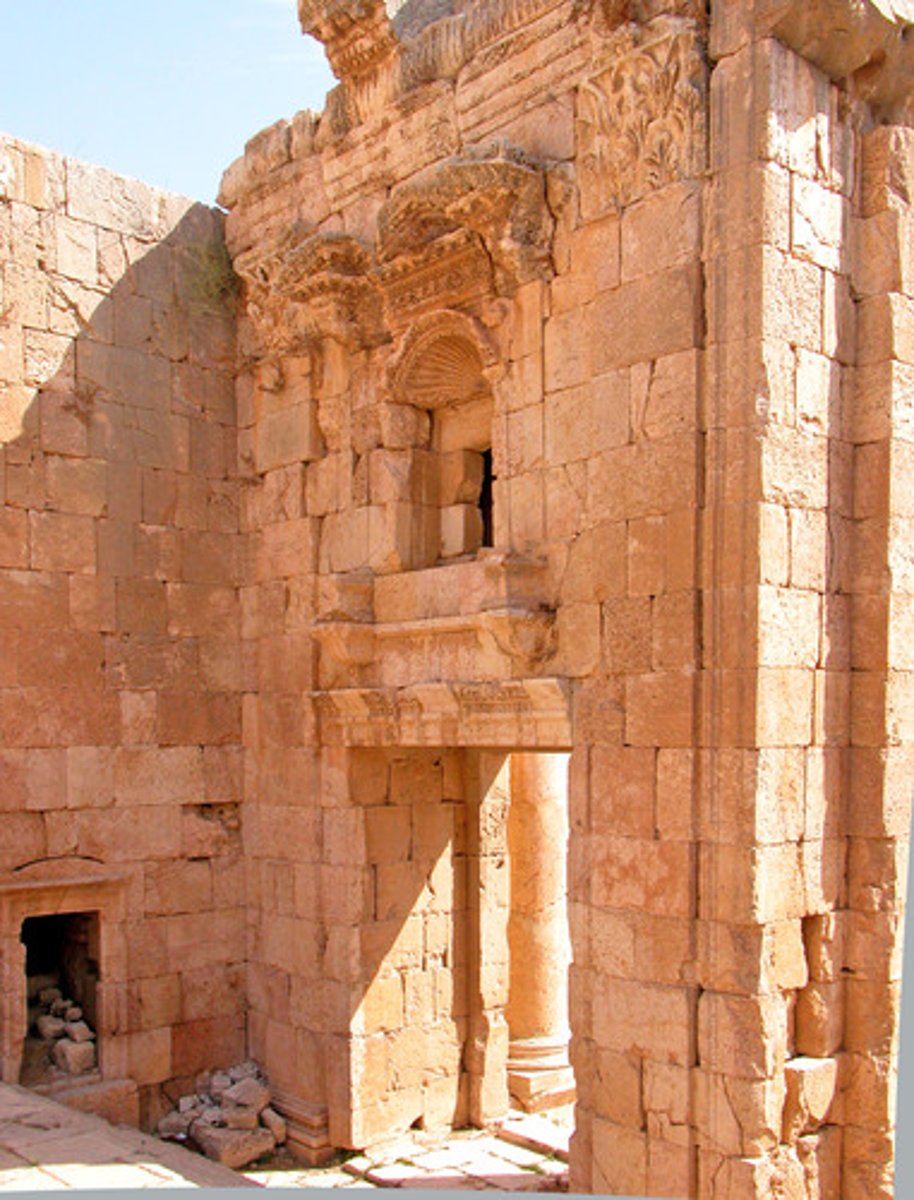 <p>a gateway leading to a Greek temple</p>