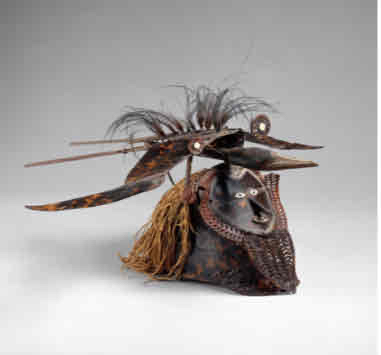 <p>torres strait, mid-late 19th century CE, turtle shell, wood, fiber, feathers</p>