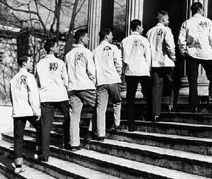 <p>white painters jackets that briefly became a fad among college boys during the 1930s</p>