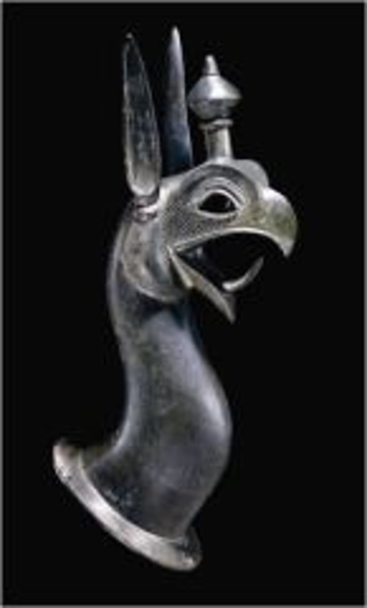 <p>A decorative element shaped like the head or upper torso of a human or animal</p>