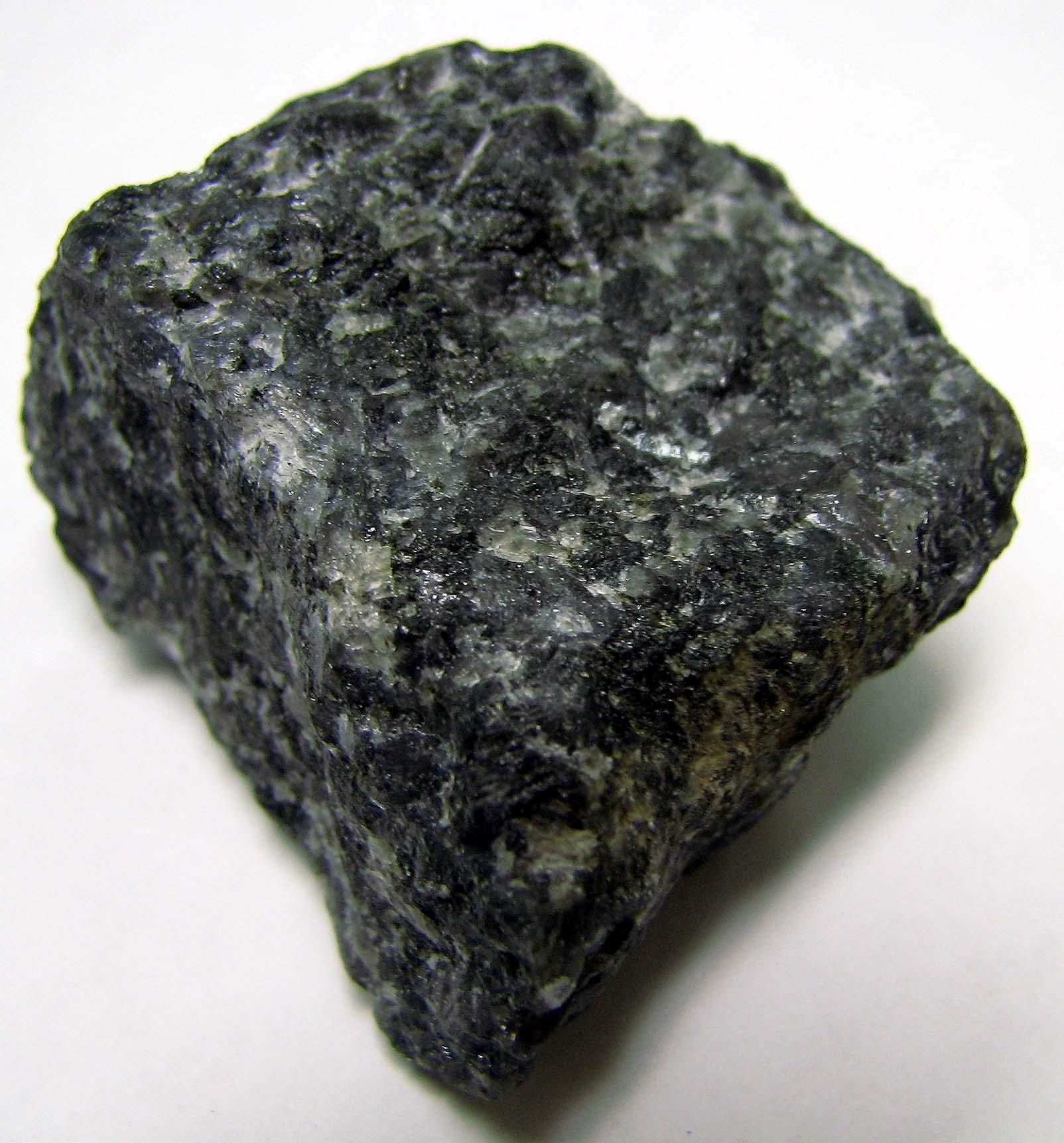 <p>Dark colored, large crystals visible, igneous</p>