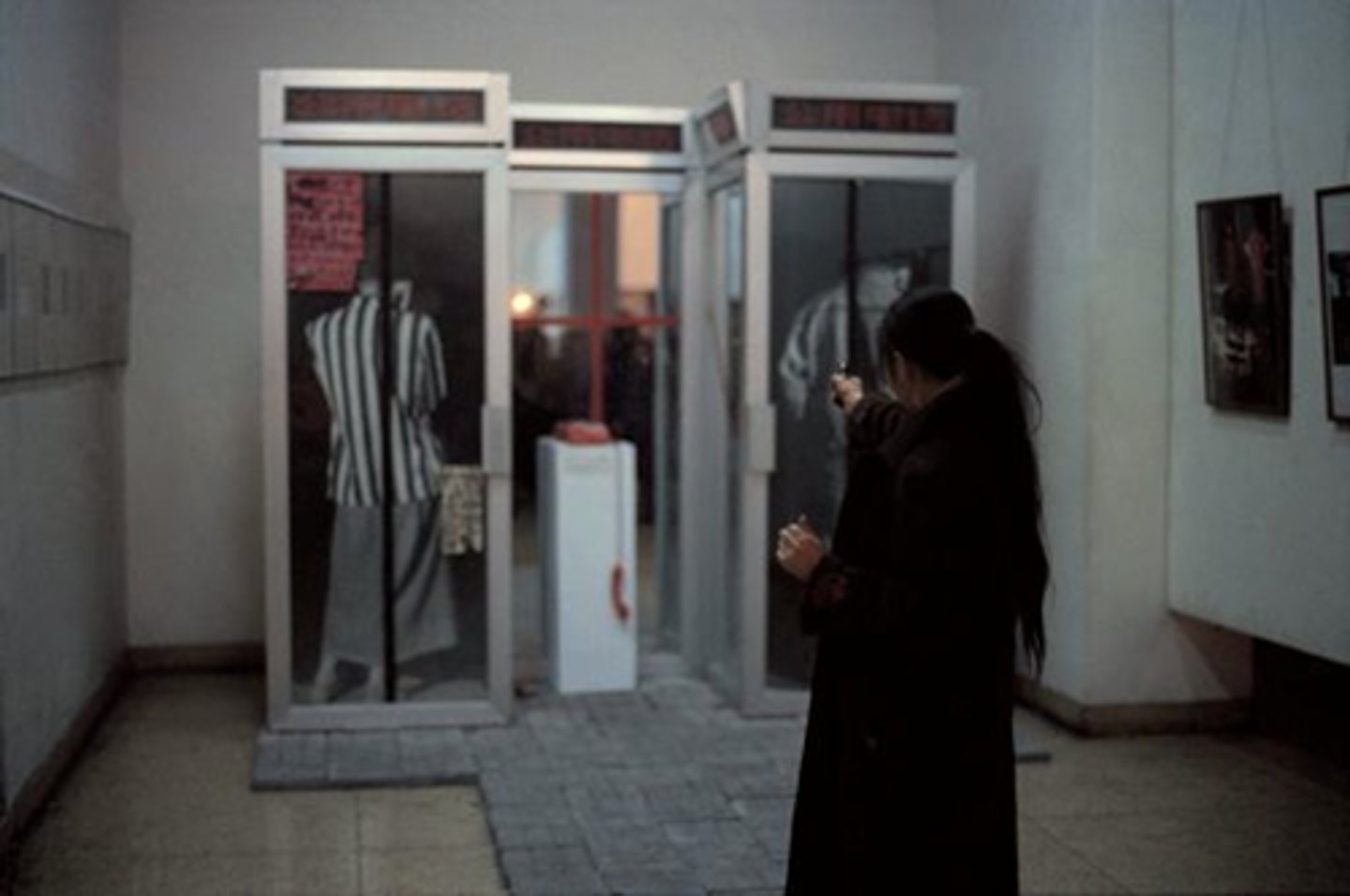 <p>Title: Dialogue</p><p>Time: 1980s.</p><p>Known for:</p><ul><li><p><strong>Xiao Lu</strong> fired two gunshots at her own installation — a phone booth-like glass structure with two telephones inside — in a <strong>symbolic act (Breaking Silence &amp; Repression)</strong></p></li><li><p><strong>The act</strong> itself <strong>became the “dialogue”</strong> — a direct, shocking confrontation with a system that suppressed open conversation.</p></li><li><p>possibly foreshadowed <strong>Tiananmen Square protests</strong> later that year.</p></li></ul><p></p>
