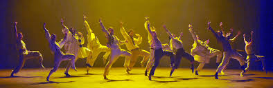 <p>Doing something at the same time and in the same way as someone else.</p>